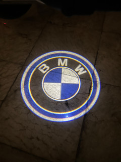 ولکام لایت طرح bmw رودری خودرو سنسوردار | چراغ خوشآمدگویی درب ماشین با باتری نیمقلمی
